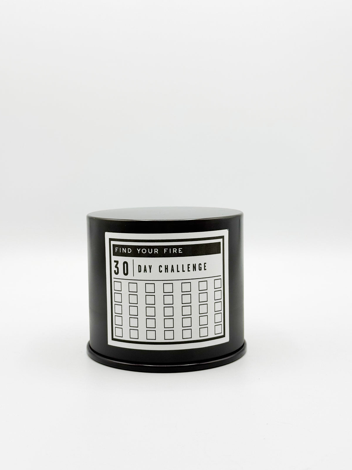 Find Your Fire 30 Day Challenge Candle.  Black tin candle including a label with 35 checkboxes to cross off day by day as you complete the movement challenge.